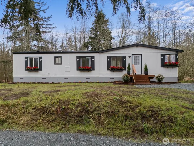 a backyard of a house with seating space
