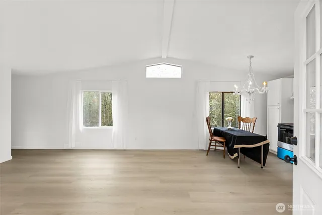 a room with a window and a table