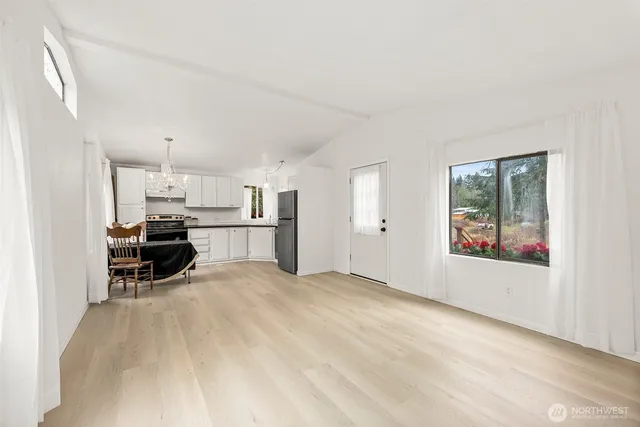 a large room with a bed and furniture