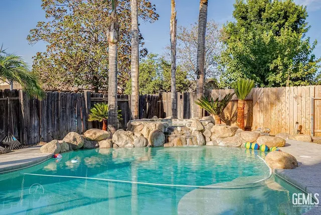 a view of yard with patio