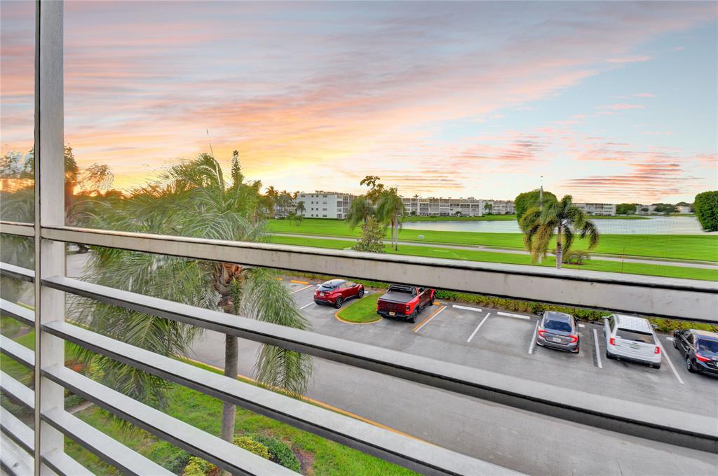 33 Fanshaw A, Unit 33 Boca Raton, FL 33434 - Photo 12 of 16 a view of swimming pool with an outdoor seating