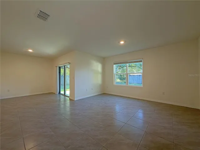 an empty room with window