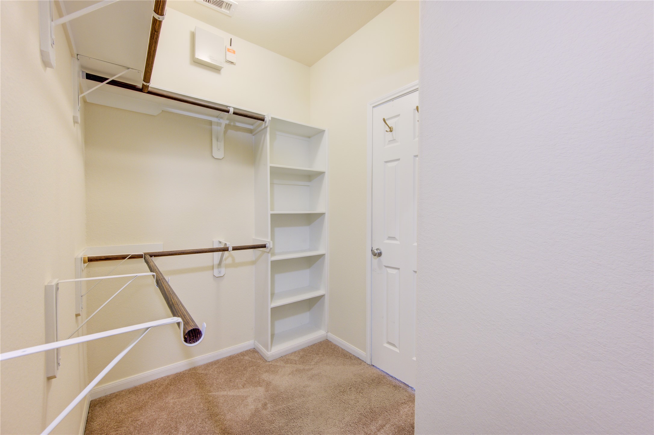 6518 Wilshire Ridge Houston, TX 77040 - Photo 19 of 30 Closet space with storage area.