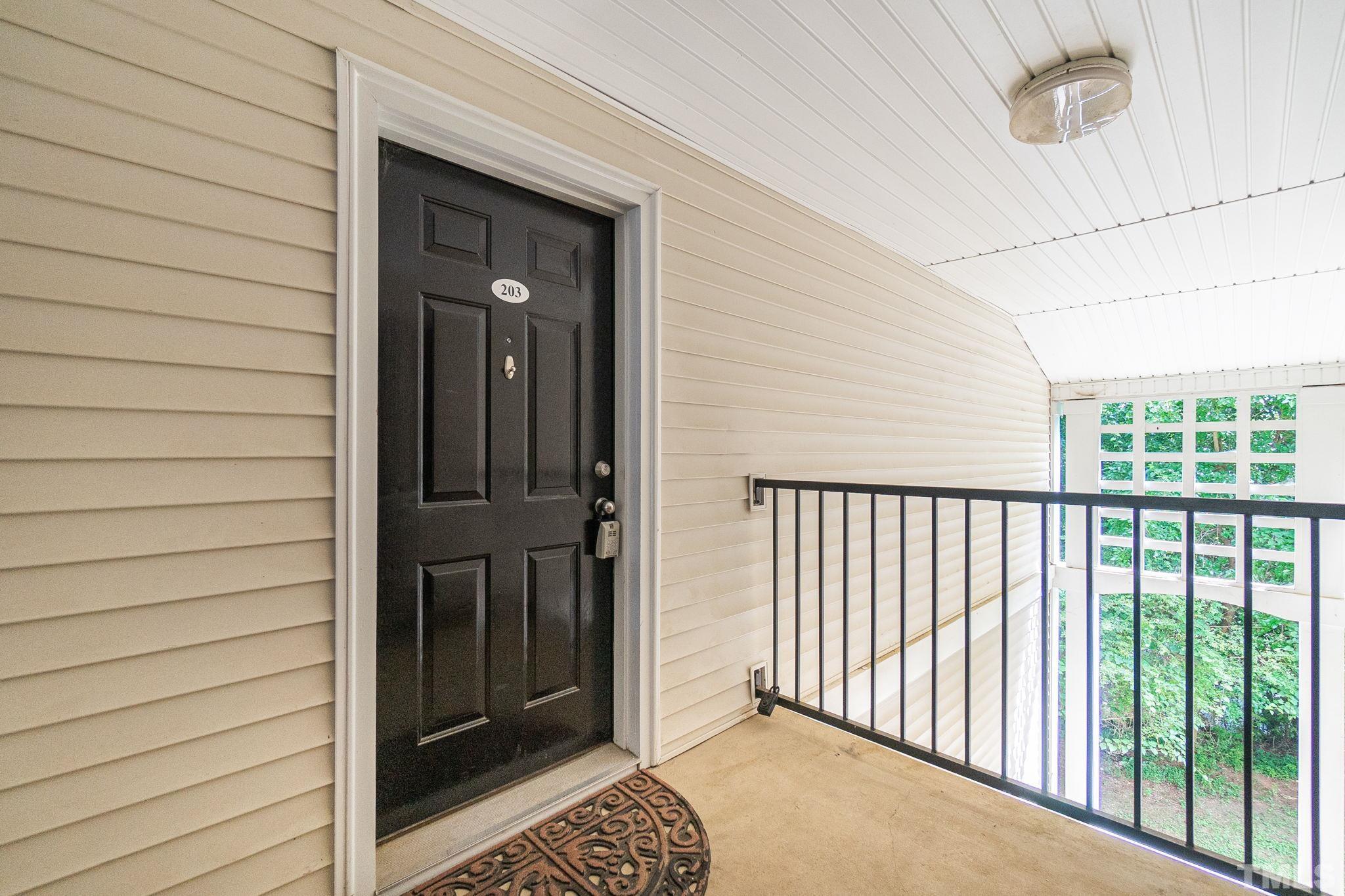 2308 Myron Drive, Unit 203 Raleigh, NC 27607 - Photo 4 of 26 a view of a balcony