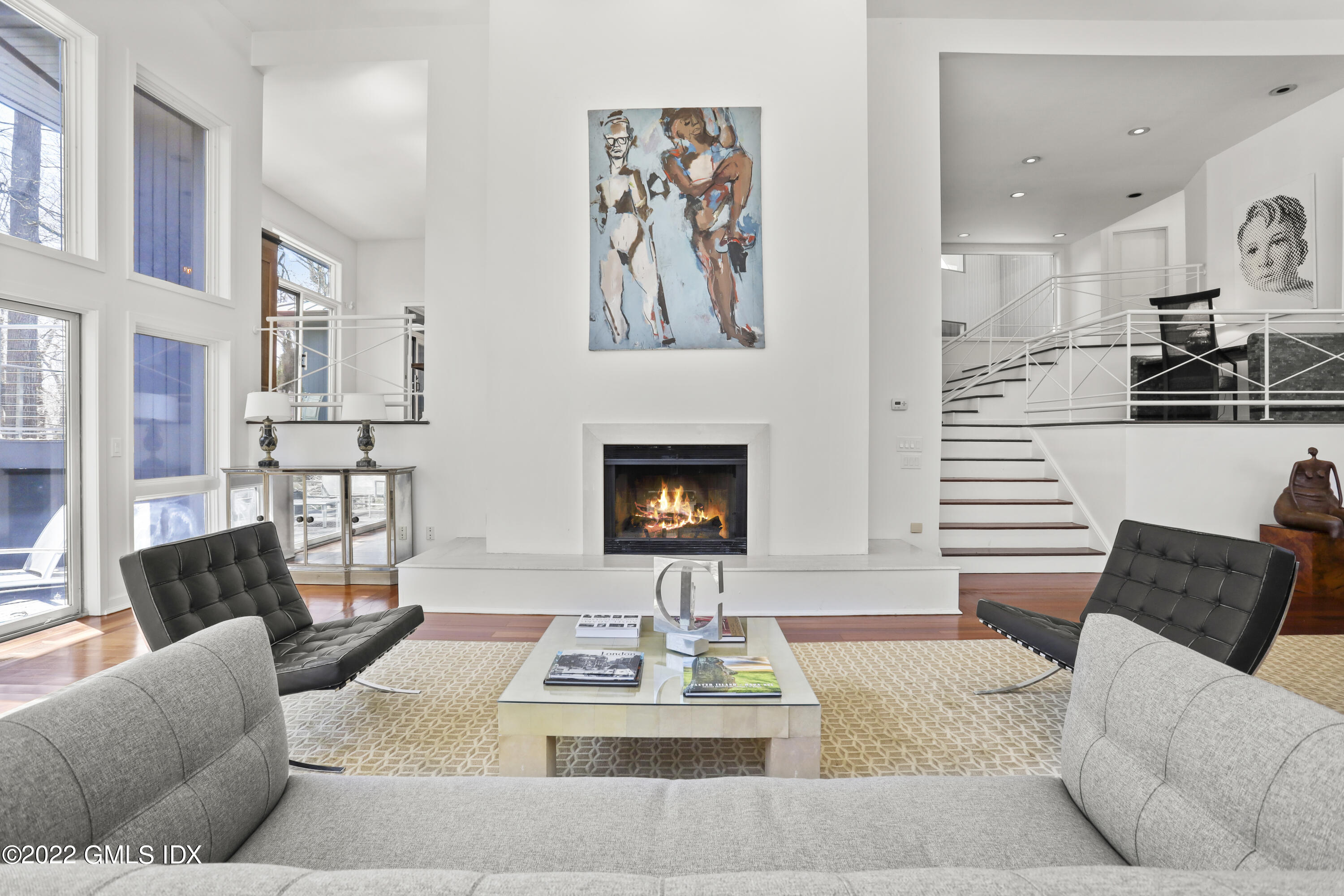 4 Chateau Ridge Road Greenwich, CT 06831 - Photo 11 of 37 a living room with furniture and a fireplace