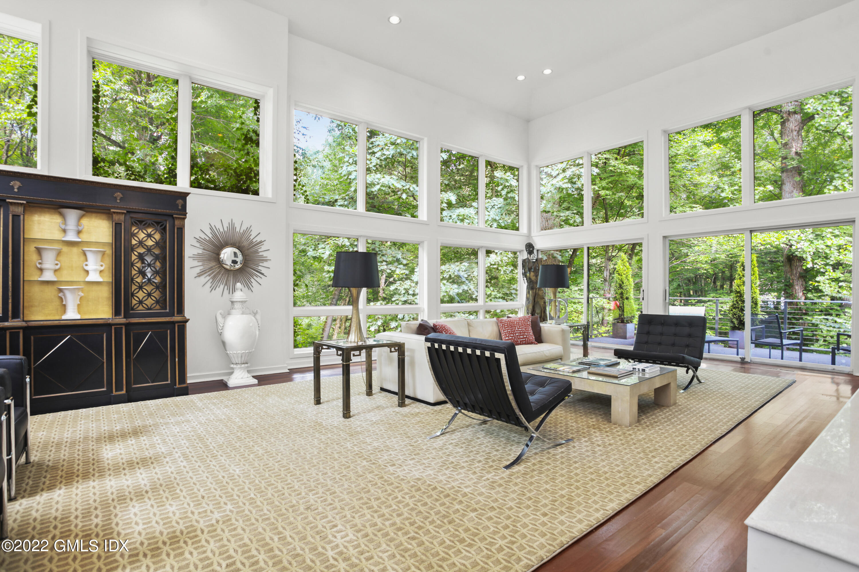 4 Chateau Ridge Road Greenwich, CT 06831 - Photo 13 of 37 a living room with furniture and windows