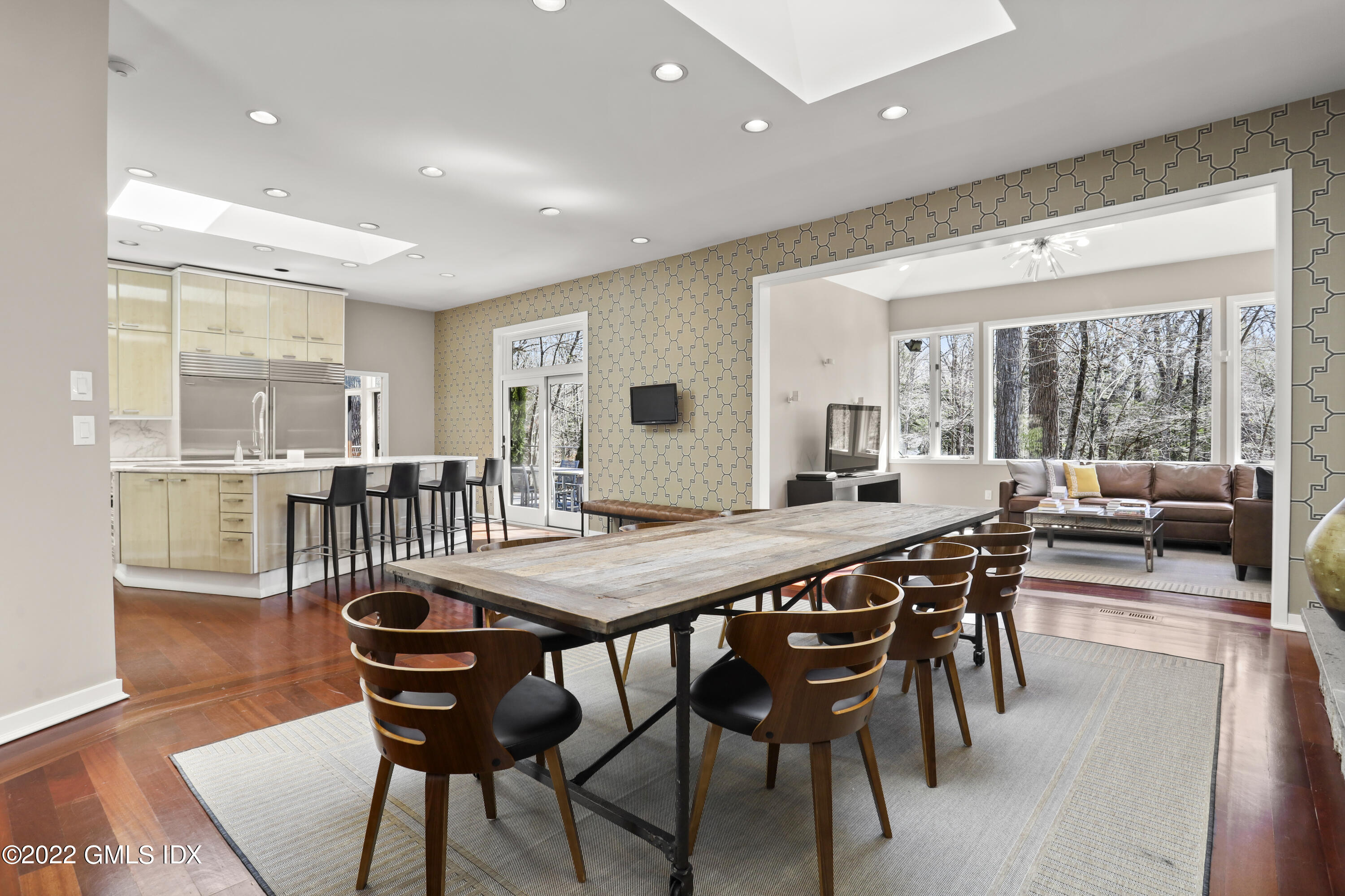 4 Chateau Ridge Road Greenwich, CT 06831 - Photo 15 of 37 a view of a dining room with furniture and wooden floor