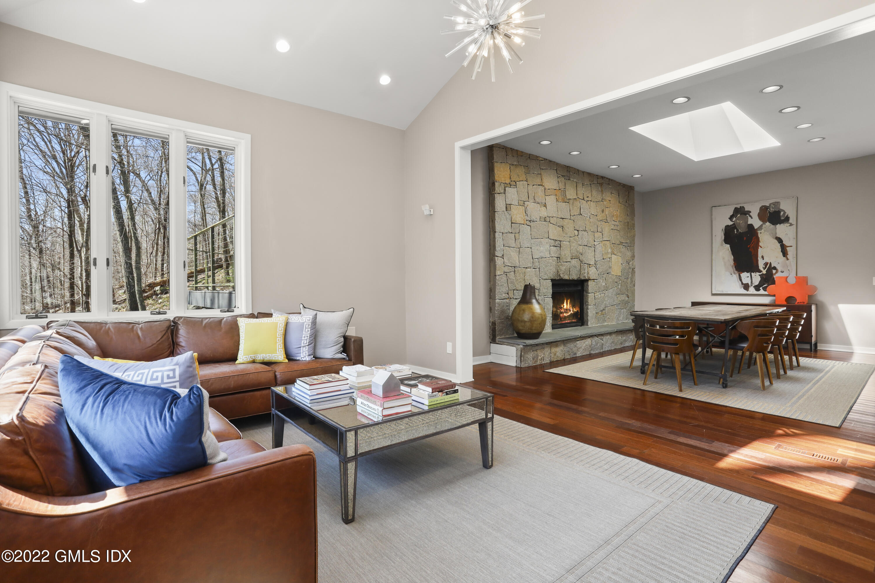 4 Chateau Ridge Road Greenwich, CT 06831 - Photo 20 of 37 a living room with furniture and a fireplace