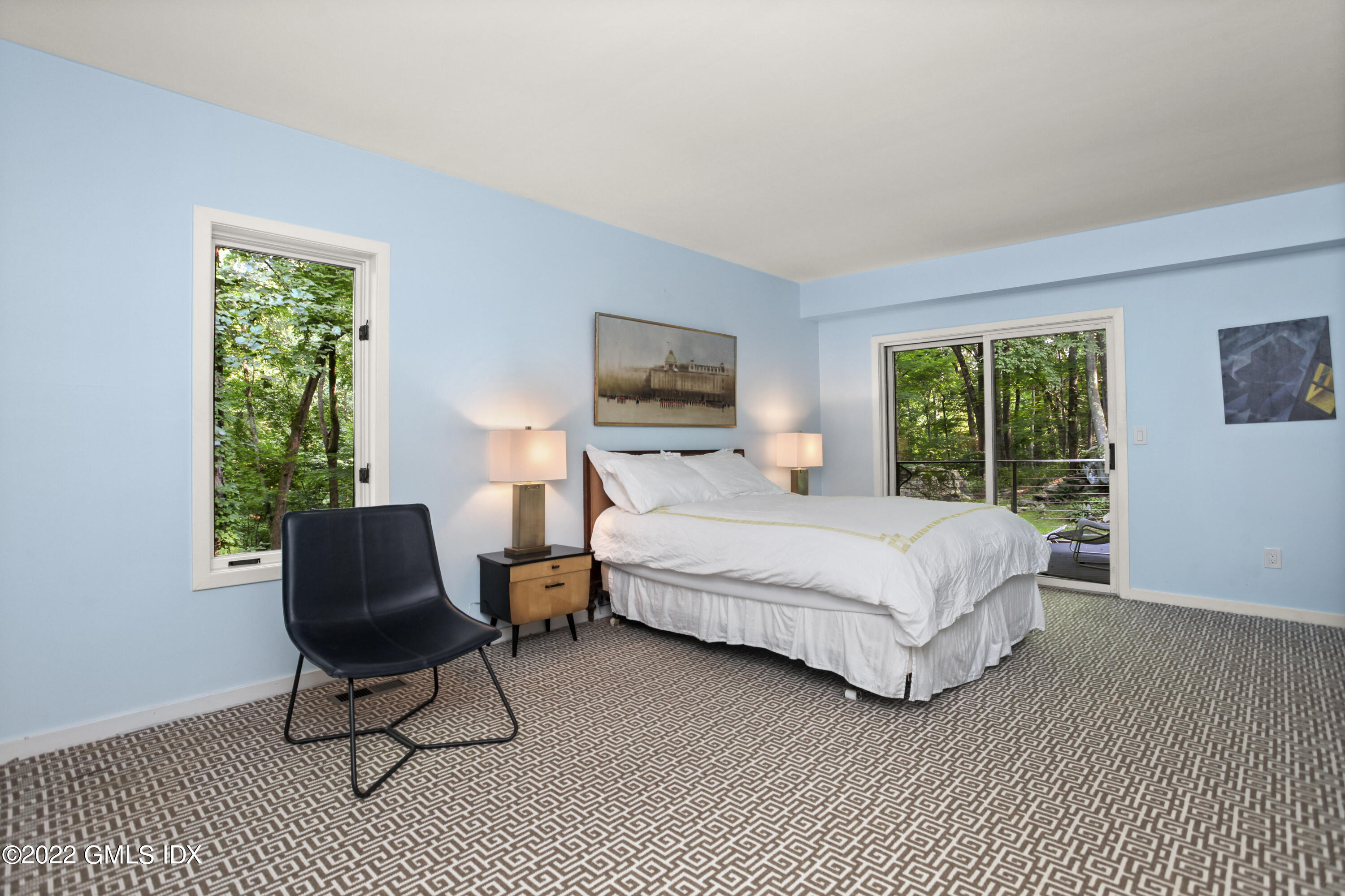 4 Chateau Ridge Road Greenwich, CT 06831 - Photo 26 of 37 a bedroom with a bed chairs and window