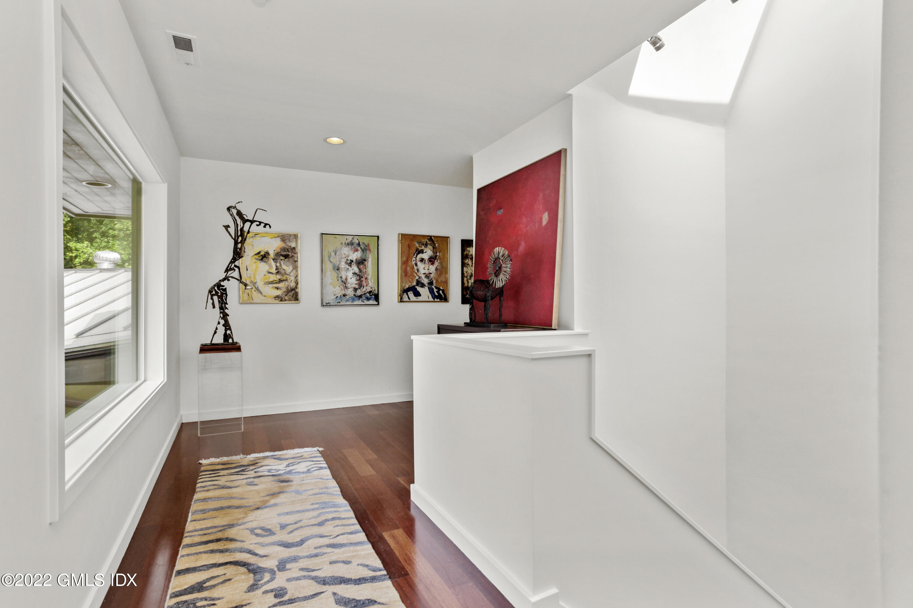 4 Chateau Ridge Road Greenwich, CT 06831 - Photo 29 of 37 a view of a hallway with workspace