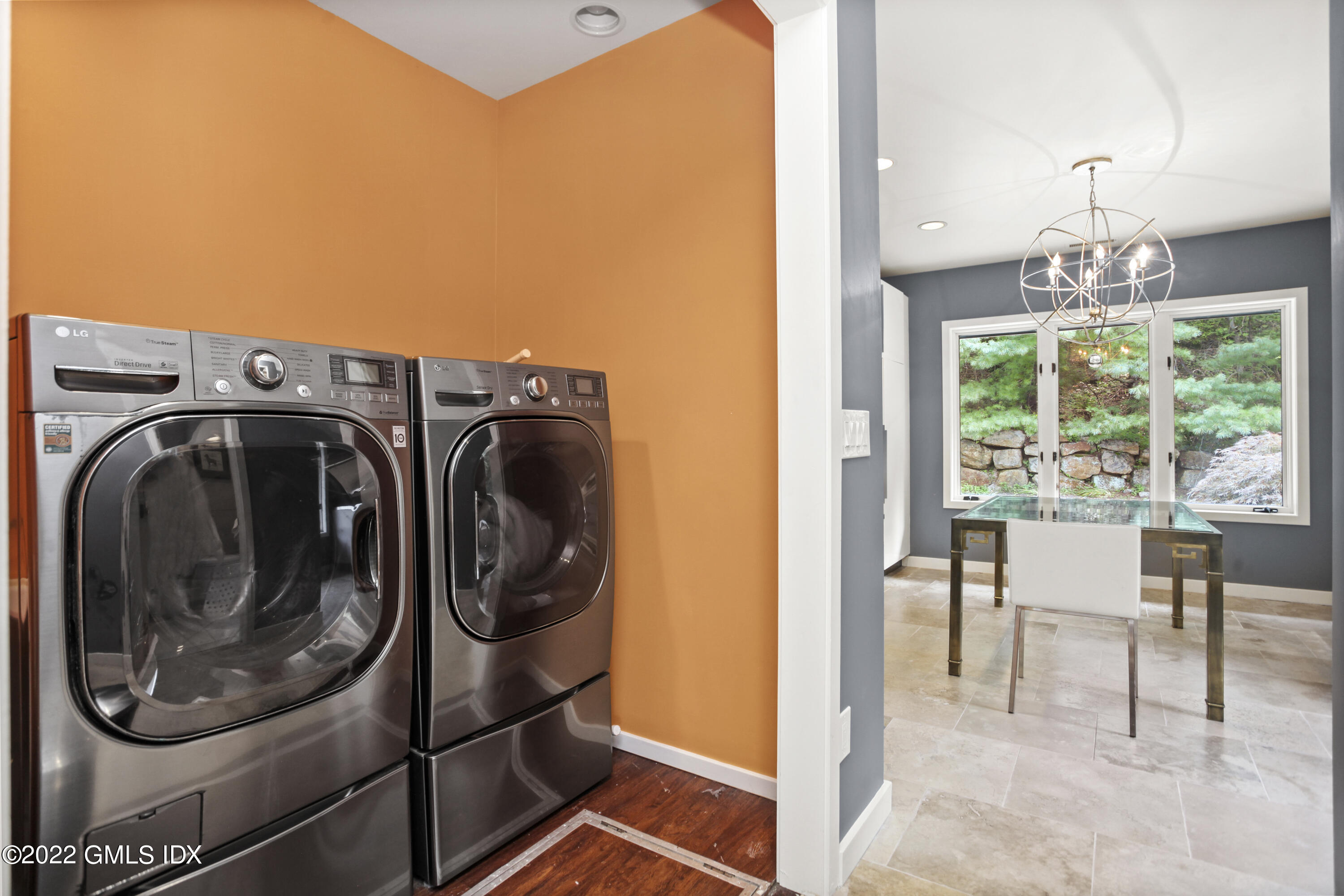 4 Chateau Ridge Road Greenwich, CT 06831 - Photo 30 of 37 a view of a storage & utility room with washer and dryer