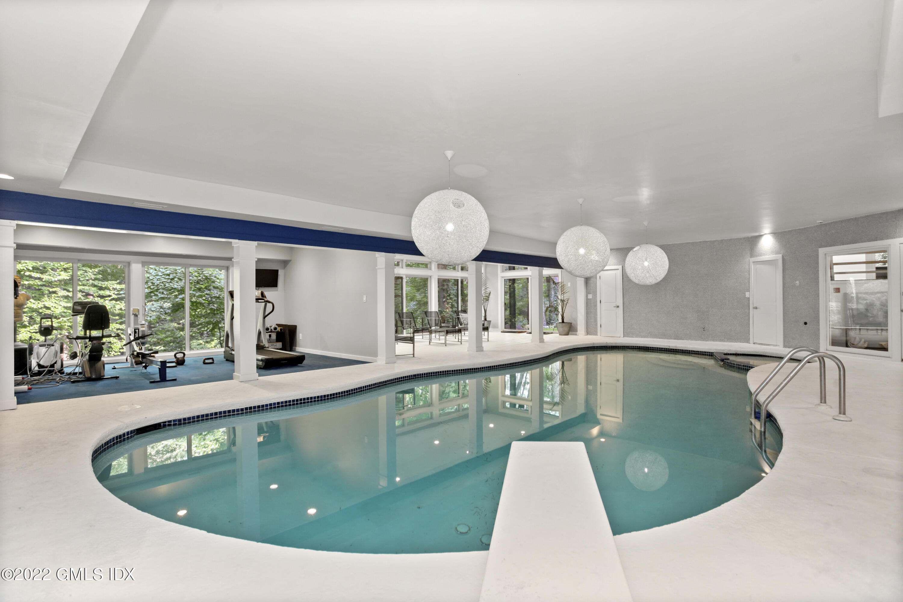 4 Chateau Ridge Road Greenwich, CT 06831 - Photo 32 of 37 a view of a living room and dining room
