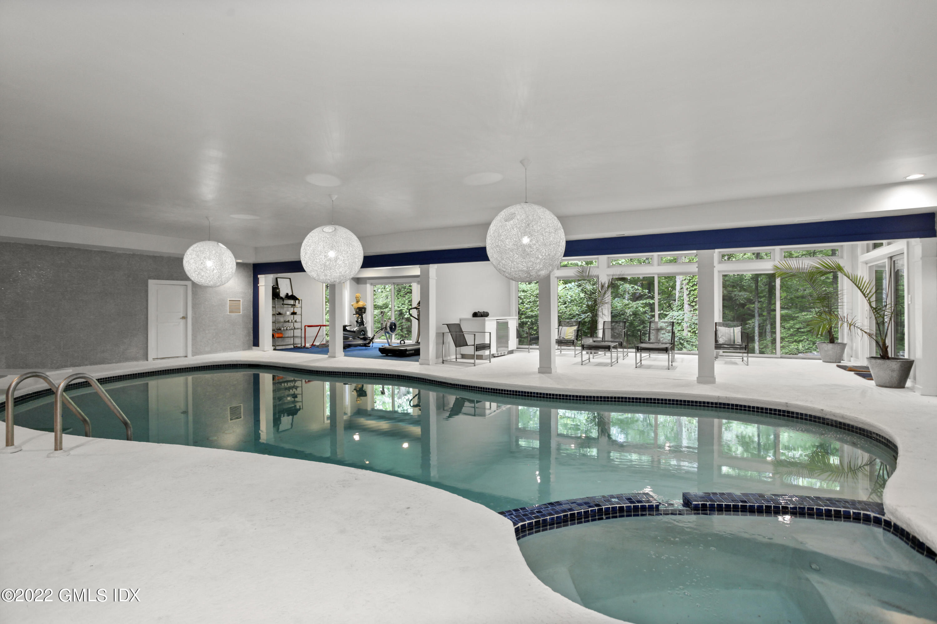 4 Chateau Ridge Road Greenwich, CT 06831 - Photo 33 of 37 a kitchen with a stove and a large window
