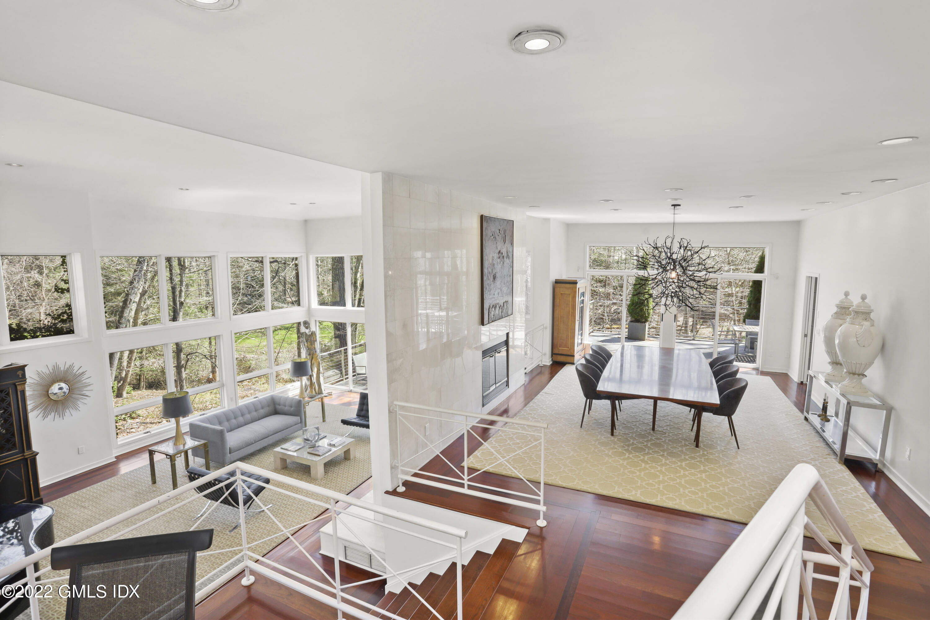 4 Chateau Ridge Road Greenwich, CT 06831 - Photo 10 of 37 a living room with furniture and a table