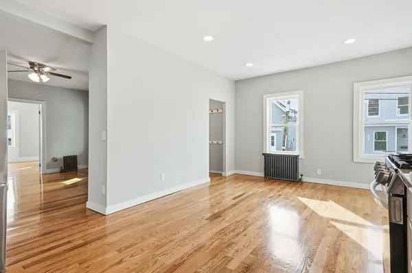 a view of livingroom and hardwood floor