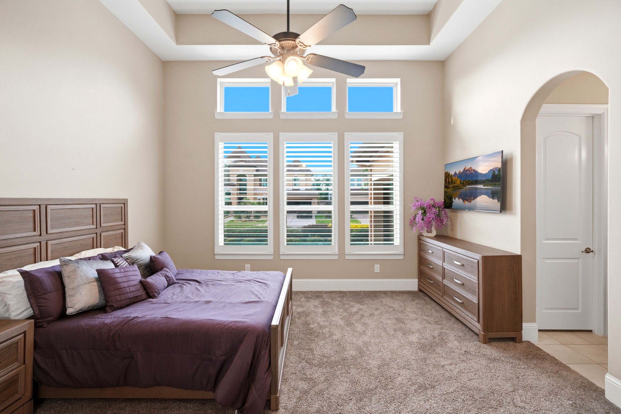 5815 Stratton Woods Drive Spring, TX 77389 - Photo 37 of 45 a bedroom with furniture and a chandelier