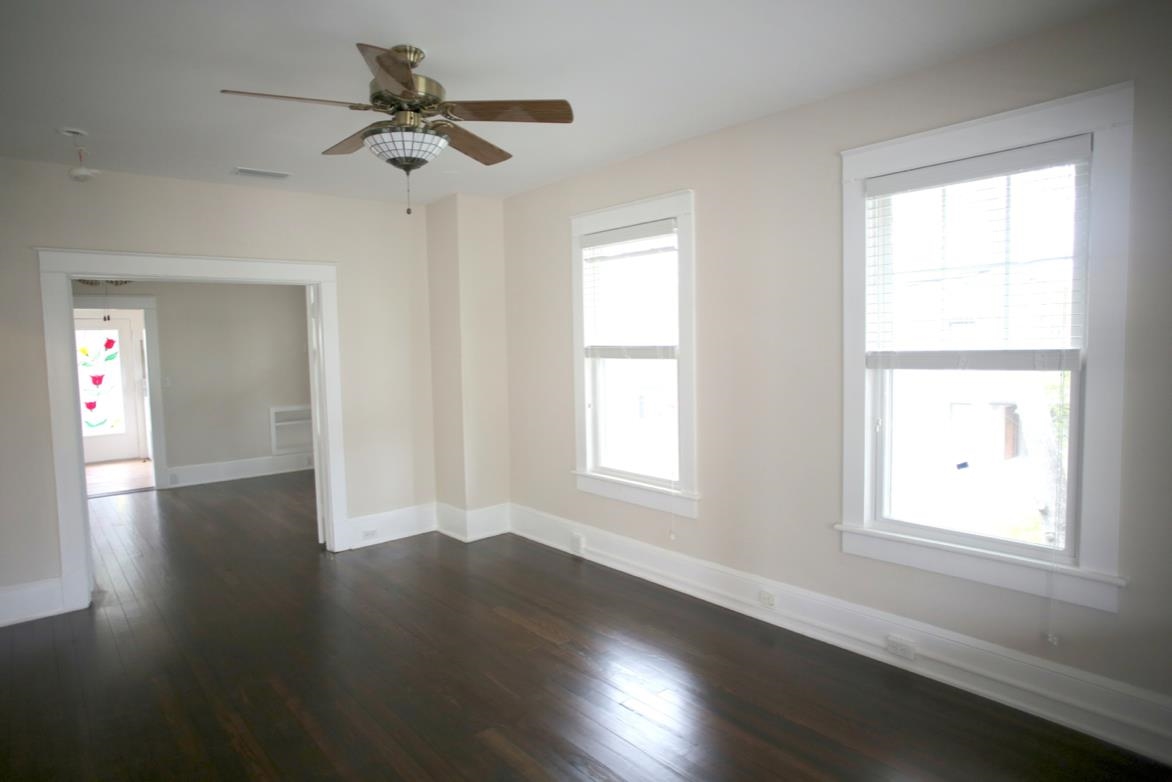 78 Riberia Street St. Augustine, FL 32084 - Photo 28 of 38 a view of an empty room with wooden floor and a window