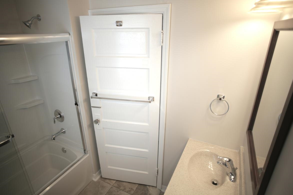 78 Riberia Street St. Augustine, FL 32084 - Photo 31 of 38 a bathroom with a tub and shower