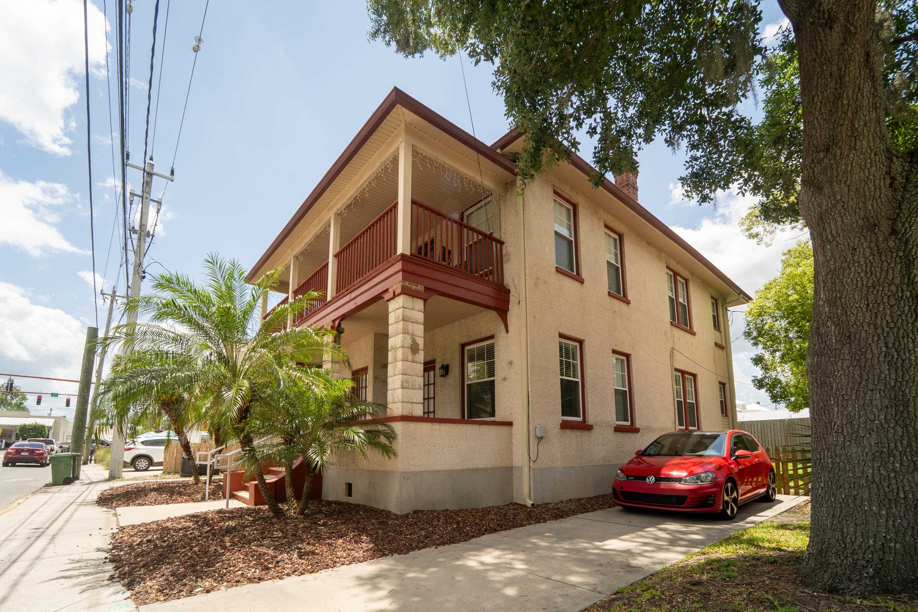 78 Riberia Street St. Augustine, FL 32084 - Photo 32 of 38 a front view of a house with a yard