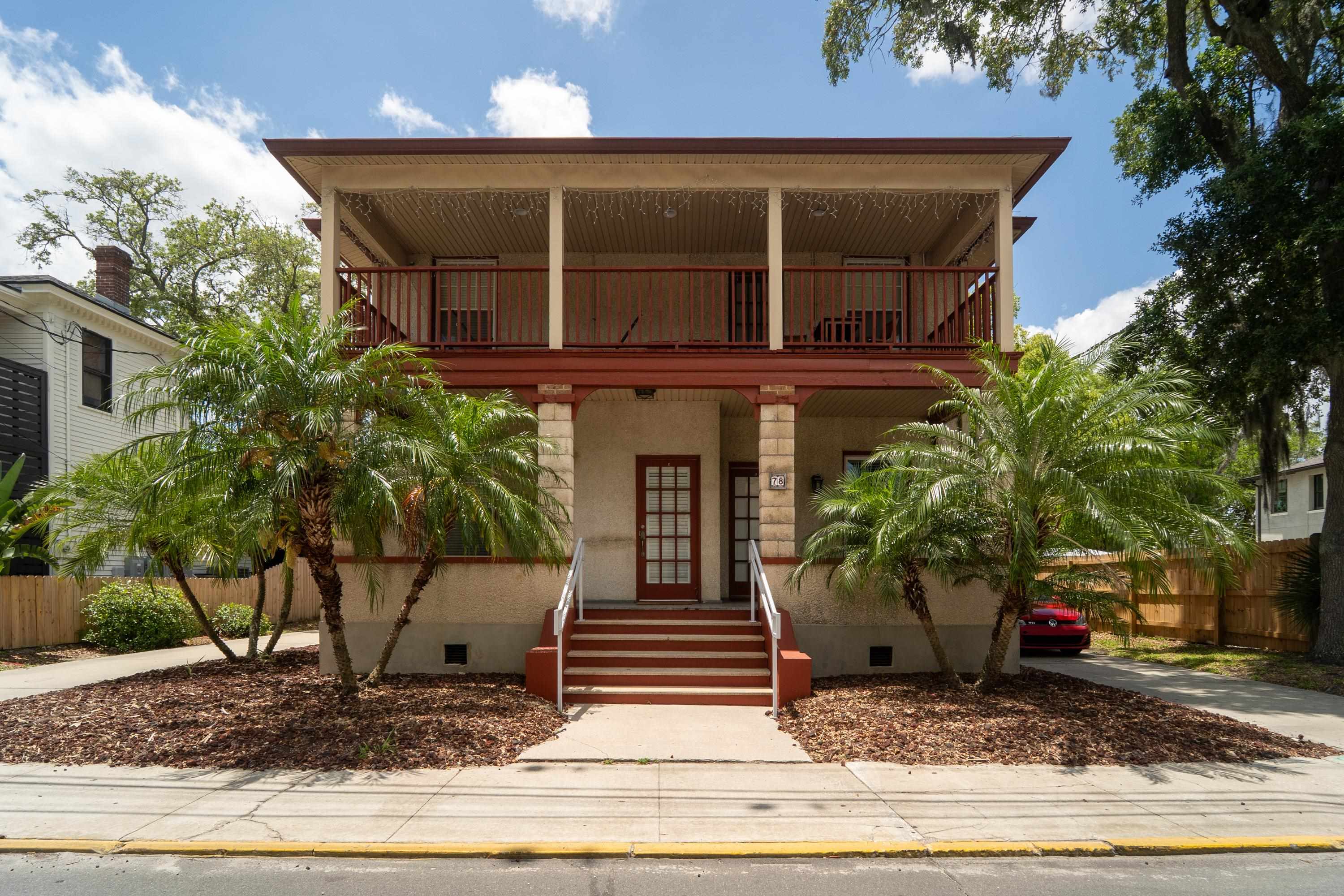 78 Riberia Street St. Augustine, FL 32084 - Photo 33 of 38 a front view of a house with garden