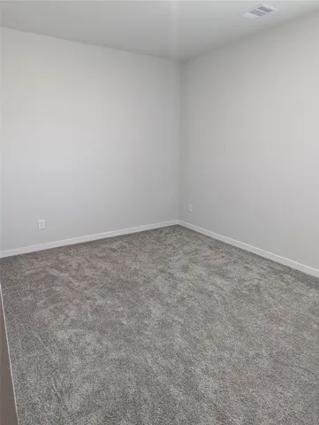 an empty room with an entryway