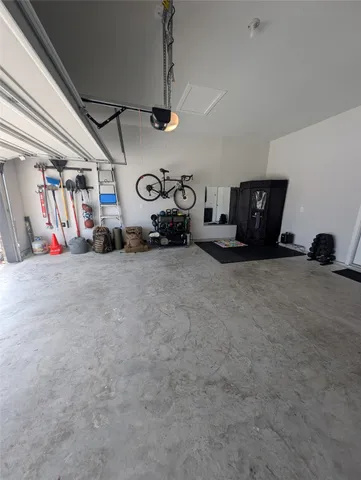 a view of parking garage with cars