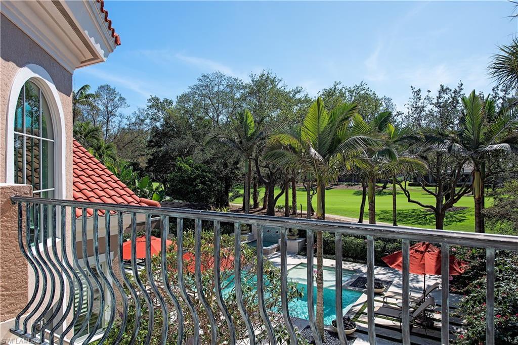 7100 Verde Way Naples, FL 34108 - Photo 17 of 18 a view of street from balcony