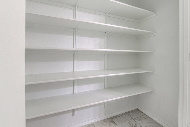 1237 Volente Lane Leander, TX 78641 - Photo 17 of 22 Ample built-in shelving provides generous storage space.