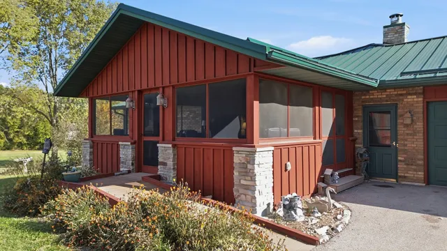 a kitchen with a sink and a stove top oven