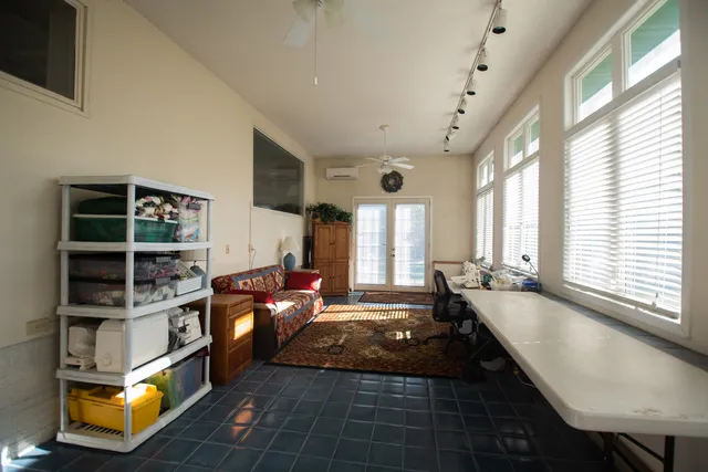 a view of a large body of water with a building in the background