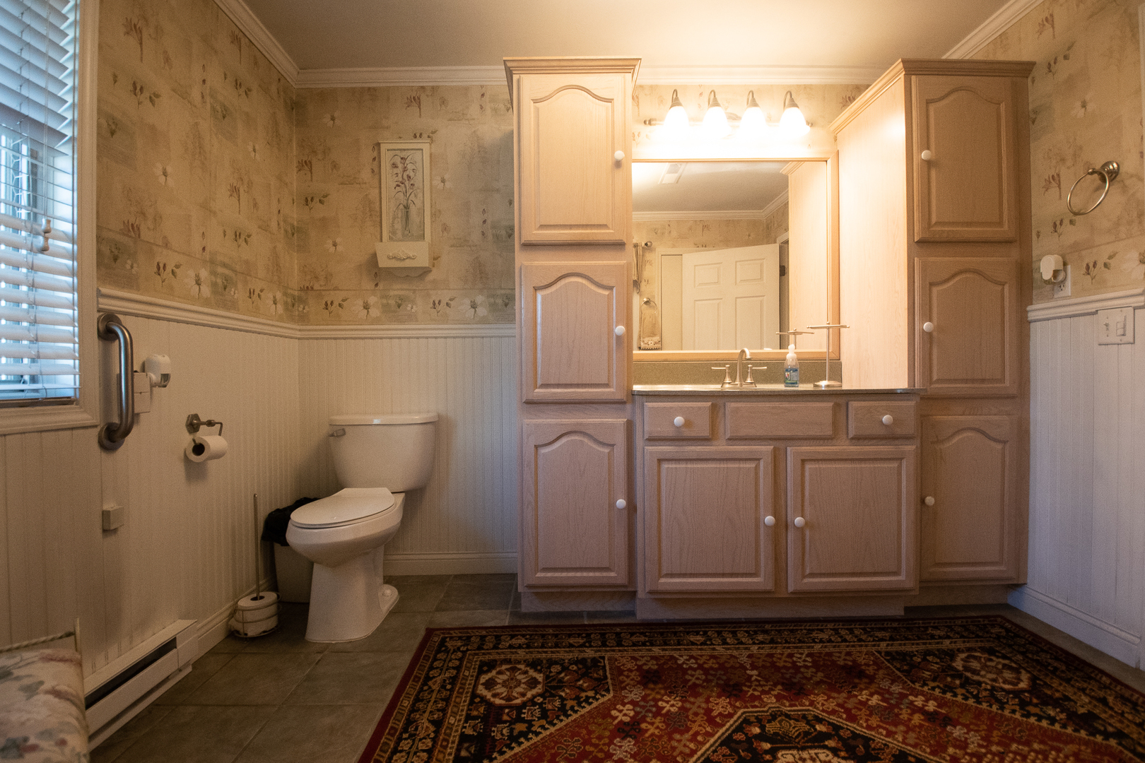 1764 Wolverine Road Dixon, IL 61021 - Photo 34 of 86 a bathroom with a granite countertop toilet sink and mirror