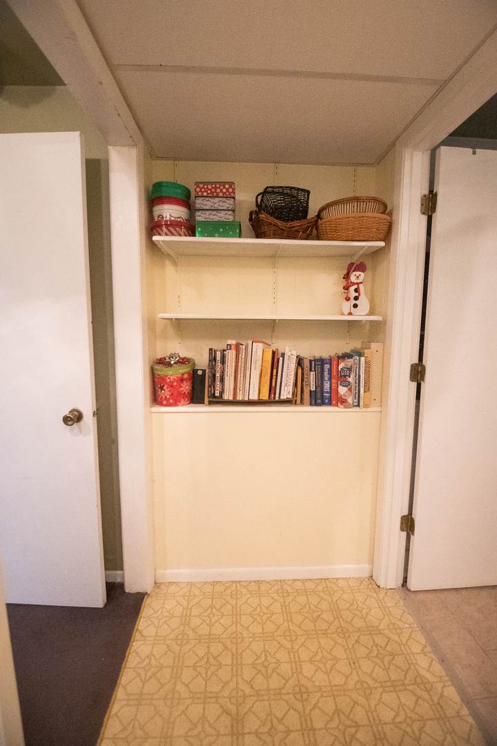 1764 Wolverine Road Dixon, IL 61021 - Photo 46 of 86 a view of walk in closet with clothes