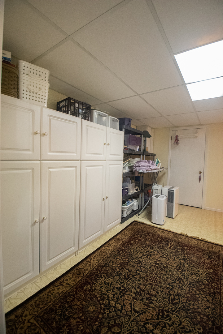 1764 Wolverine Road Dixon, IL 61021 - Photo 47 of 86 a view of a storage & utility room with a sink
