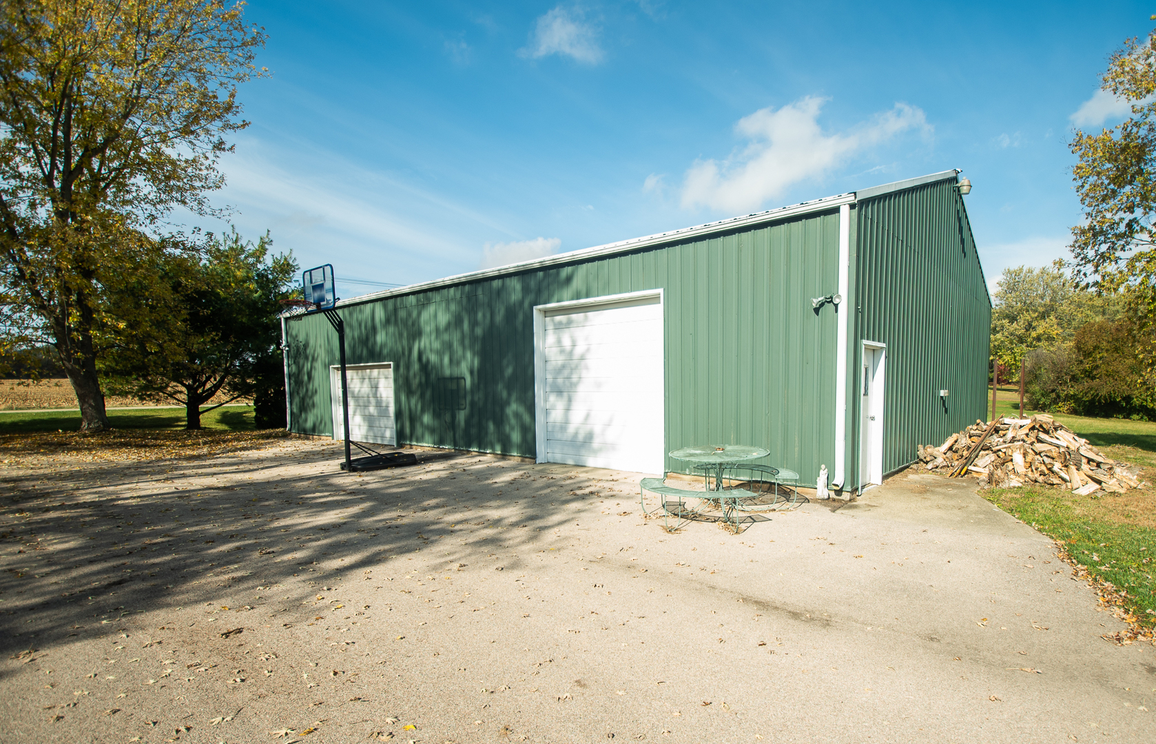 1764 Wolverine Road Dixon, IL 61021 - Photo 59 of 86 a view of a house with backyard and tree