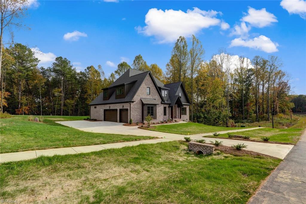 8103 Falcon Trail Oak Ridge, NC 27310 - Photo 2 of 47