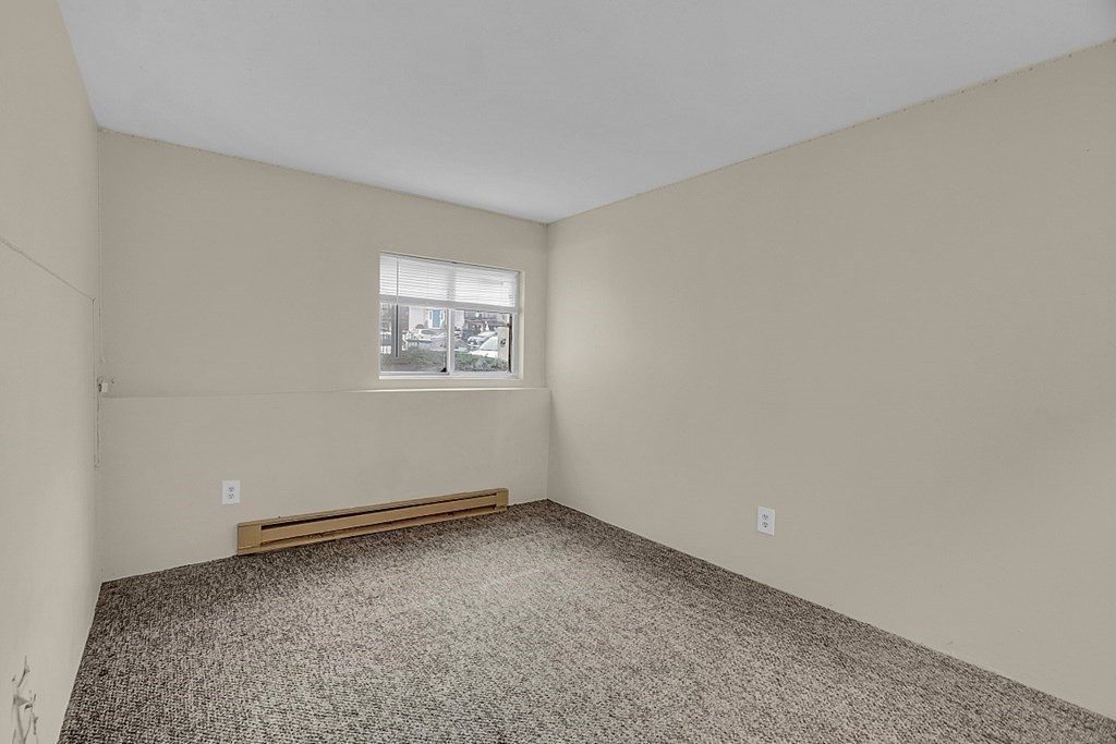 11 Gibbs Street, Unit A6 Worcester, MA 01607 - Photo 11 of 26 an empty room with a window