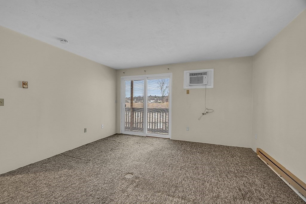 11 Gibbs Street, Unit A6 Worcester, MA 01607 - Photo 12 of 26 a view of an empty room with a window
