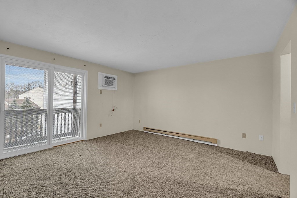 11 Gibbs Street, Unit A6 Worcester, MA 01607 - Photo 17 of 26 a view of an empty room and window