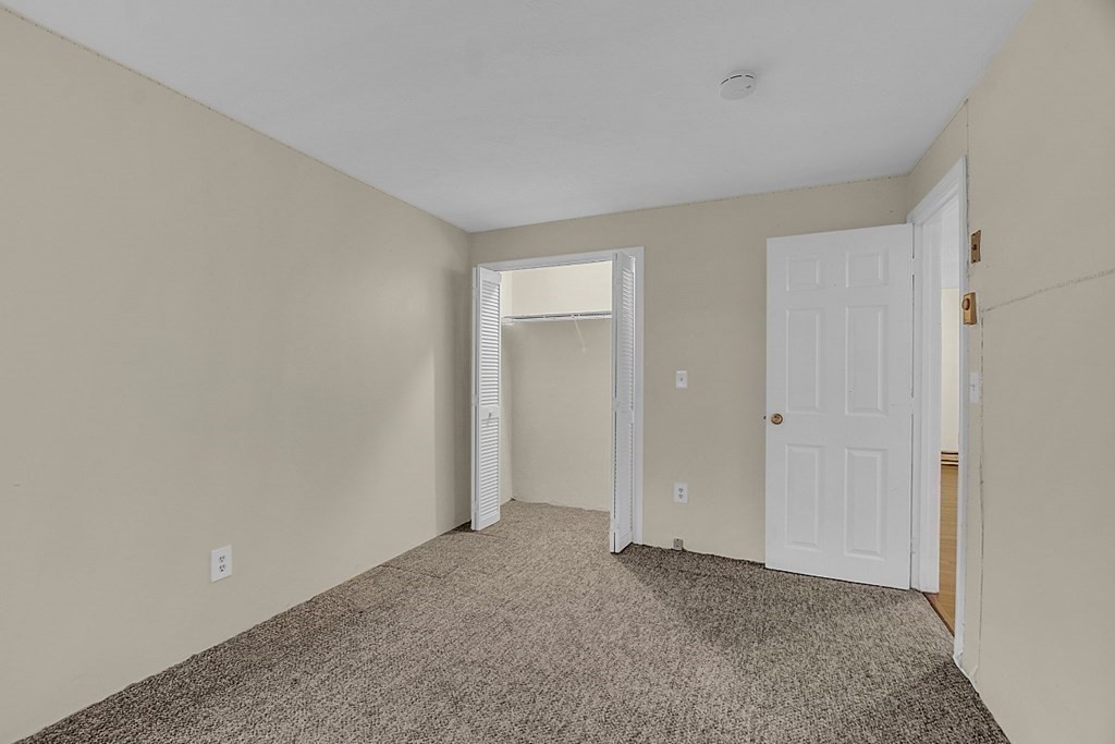 11 Gibbs Street, Unit A6 Worcester, MA 01607 - Photo 18 of 26 a view of an empty room and closet area