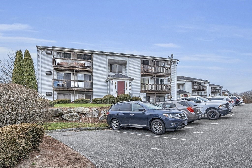 11 Gibbs Street, Unit A6 Worcester, MA 01607 - Photo 25 of 26 a car parked in front of a house