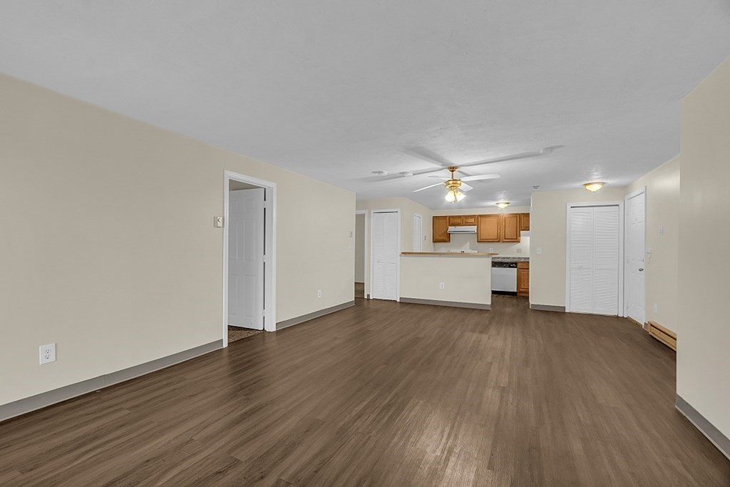 11 Gibbs Street, Unit A6 Worcester, MA 01607 - Photo 5 of 26 a view of a kitchen with a sink and a refrigerator