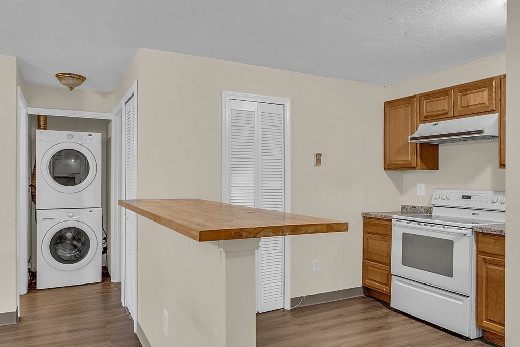 11 Gibbs Street, Unit A6 Worcester, MA 01607 - Photo 8 of 26 a utility room with sink dryer and washer