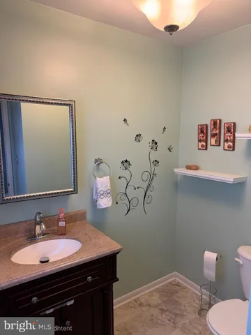 a bathroom with a sink and a toilet
