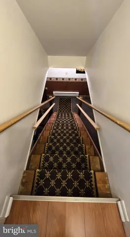 a view of a balcony with furniture