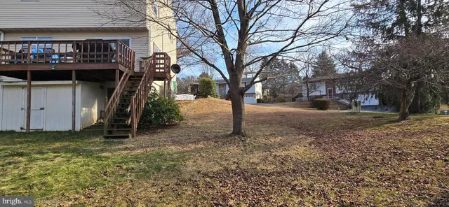 a balcony view with a seating space