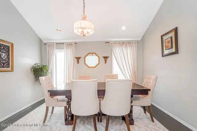 a bed room with a bed and a dresser