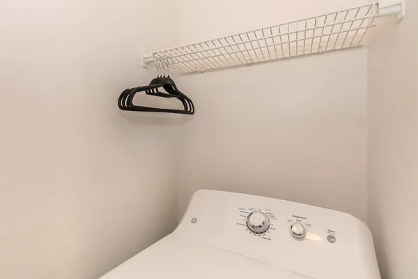 a bathroom with a sink and a window