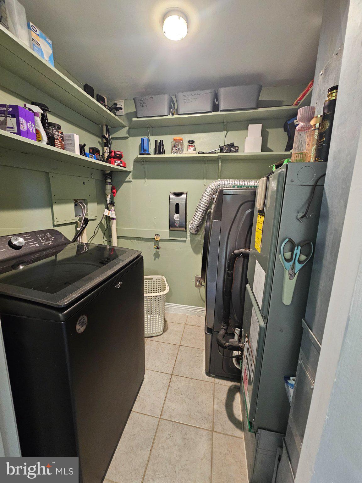 32 Parnassus Road Linden, VA 22642 - Photo 17 of 50 Efficient laundry space with storage.
