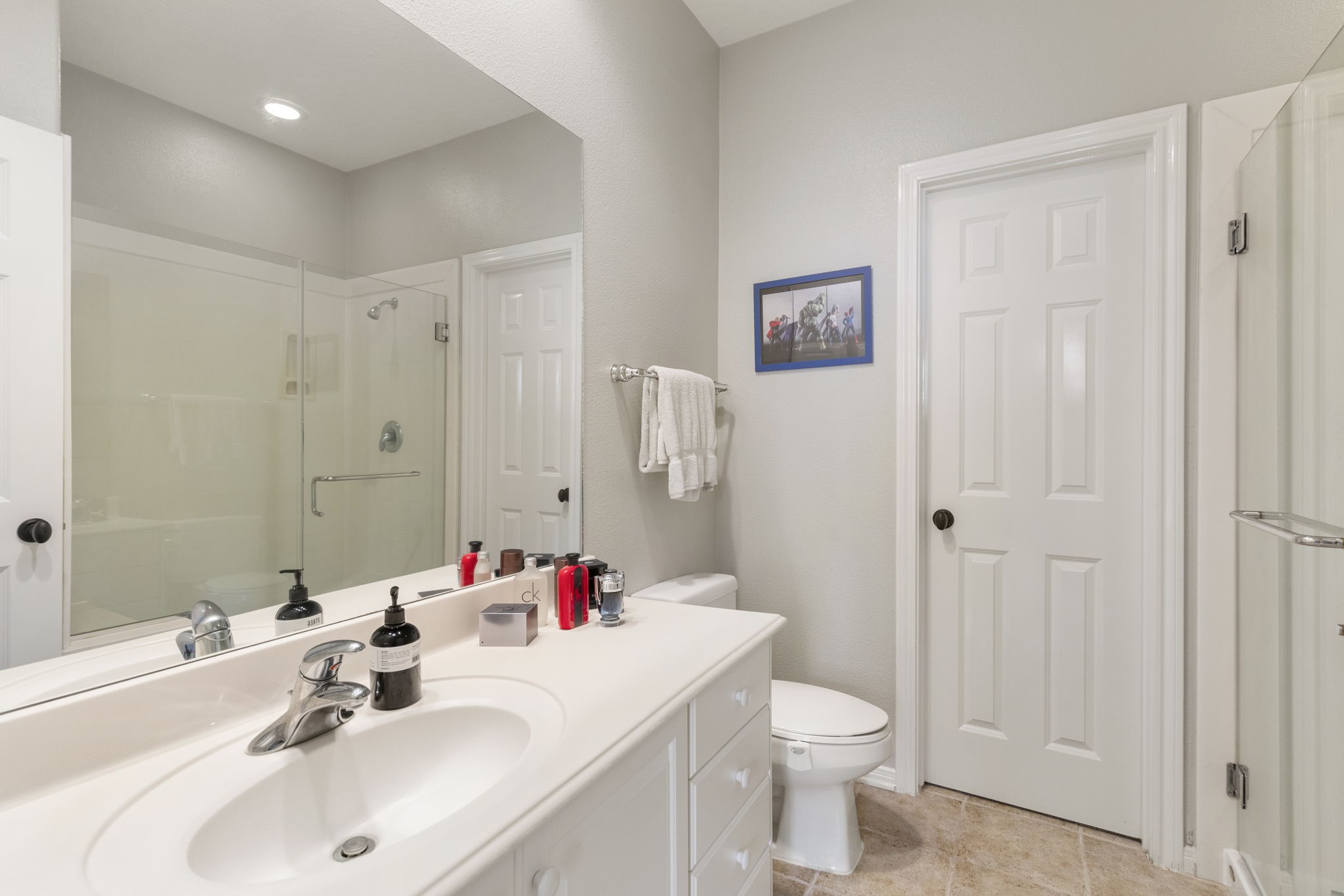107 East Mirror Ridge Circle The Woodlands, TX 77382 - Photo 37 of 47 a bathroom with a sink toilet and shower