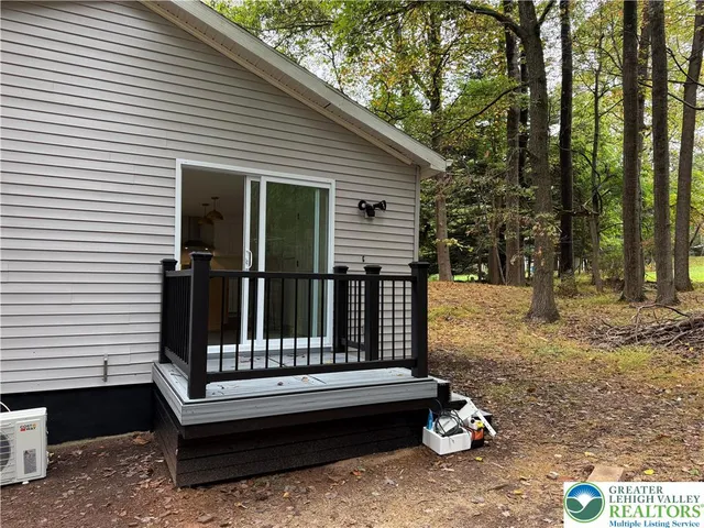 a view of a deck with a backyard
